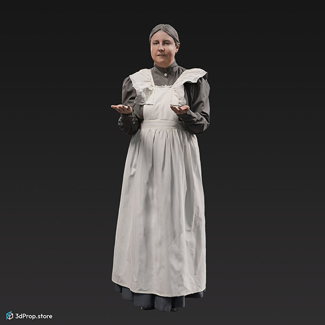 3D scan of a standing, middle-aged maid, wearing a white apron and a grey long-sleeved dress underneath, and she is holding a silver serving tray, from the 1910s, Europe. 
Probably a noble family's maid.