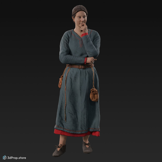 3D scan of a standing, thinking Danish, viking woman from the 900s, Europe, wearing blue linen and wool clothing with metal jewellery .