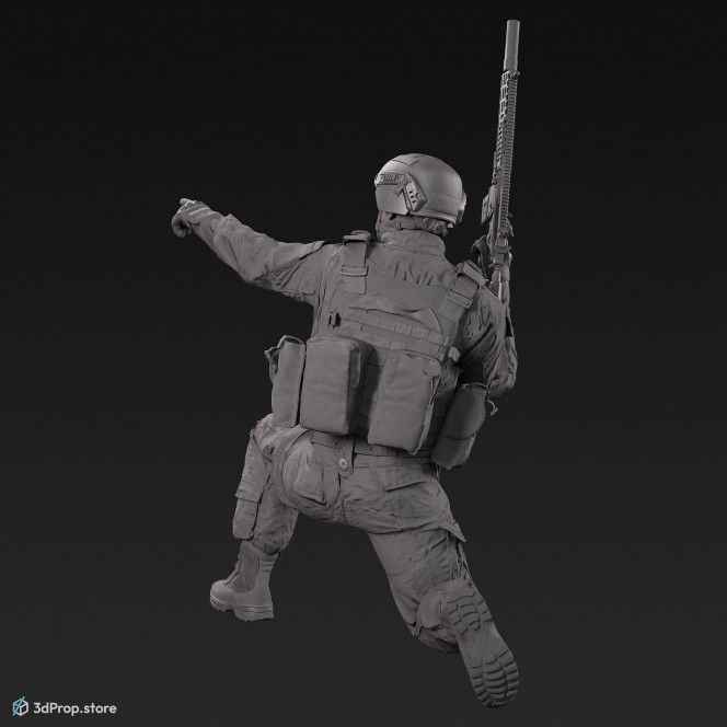 3D model of a kneeling soldier, holding his weapon in one hand in a resting position and pointing into the distance with the other, from 2020, USA.