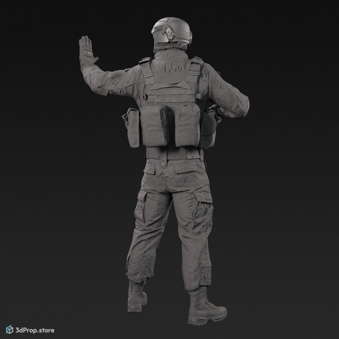 3D model of a standing soldier holding a weapon in one hand, at rest, while his other hand is held up to stop the approaching ones, from 2020, USA.