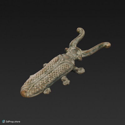 3D scan of a beetle-shaped metal boot pull that helped take off boots. The item originates from the 1900s Europe.