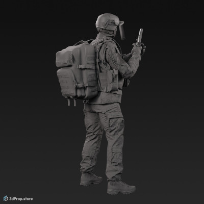 3D model of a soldier character in modern US military clothing reloading his pistol while his other weapon hangs at his side.
