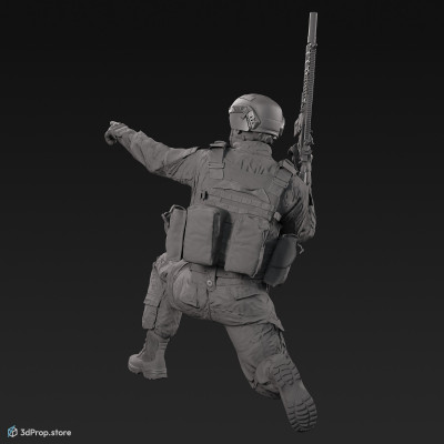 3D model of a kneeling soldier, holding his weapon in one hand in a resting position and pointing into the distance with the other, from 2020, USA.